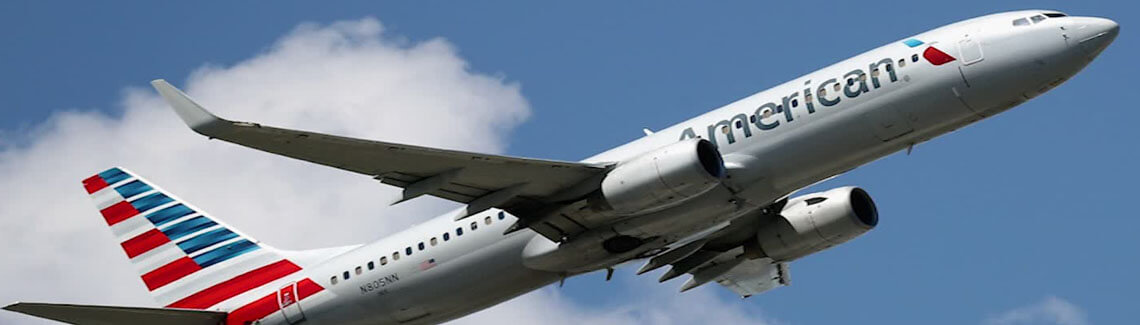 Picture of an American Airlines airplane taking plastic surgery patients to Cancun, Mexico.  The picture depicts the round-trip vacation opportunities available for patients having plastic surgery in Cancun, Mexico.